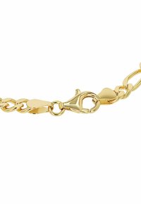 Bracciale in oro con maglie ovali e piatte collegate, dotato di chiusura a granchio sicura e finitura lucida.