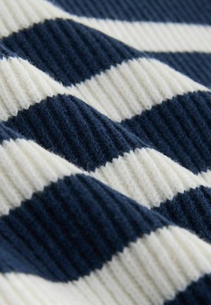 A hadsereg kék és fehér csíkos szövet bordázott textúrával rendelkezik. Az váltakozó csíkok texturáltak és bolyhosak. Az anyag puhanak és melegnek tűnik.