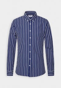 Camicia button-up blu navy con righe verticali bianche, colletto button-down, maniche lunghe e bottoni bianchi sul davanti.