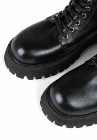 Miriade RAJA MIR - Stivaletti con plateau - nero