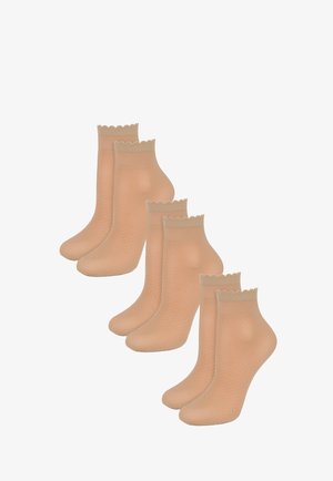 Poupée Marilyn - Skarpety