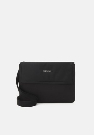 UTILITY XBODY UNISEX - Axelremsväska - black