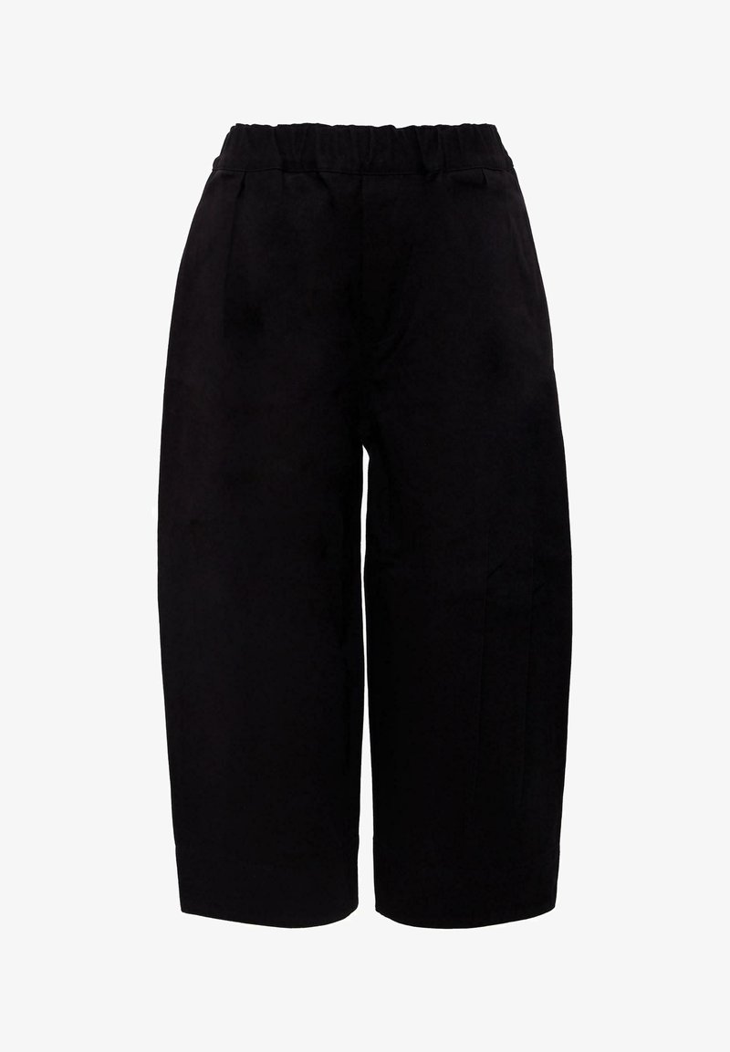 Pantalons larges noirs avec une taille élastique, présentant une texture lisse et des poches latérales, conçus pour le confort et la facilité de port.