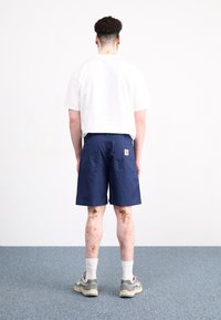 Carhartt WIP Šortky - dark-blue denim
