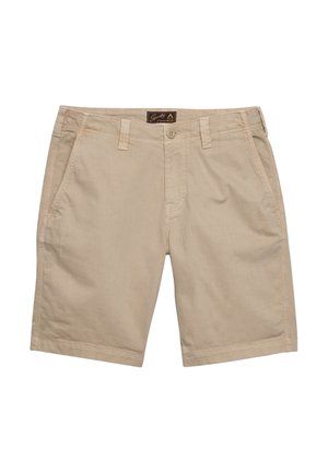 Beżowe, casualowe spodenki do kolan z przednimi kieszeniami, szlufkami na pasek, zapięciem na guzik oraz małą metką marki na środku talii.