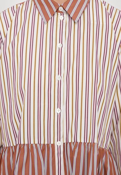 Striped shirt with brown and white tones, featuring a button-up front, pointed collar, and gathered hemline with multiple contrasting stripes.