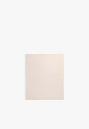 Quadratische beige Badematte mit einem dezenten strukturierten karierten Muster aus wellenförmigen und geraden Linien.