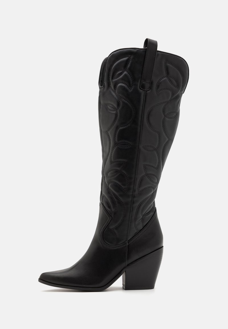 Black leather cowboy boots featuring a tall shaft with curved stitching patterns, pointed toe, and a chunky heel.