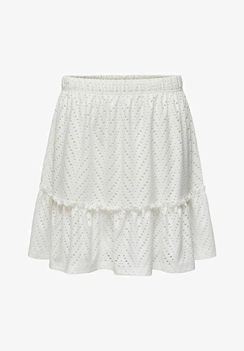 Jupe blanche en tissu à œillets avec taille élastique et ourlet à volants, présentant un motif chevron de petits trous.