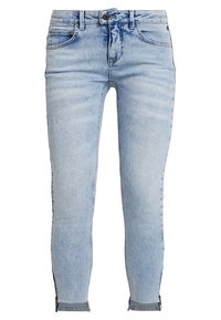 Jeans skinny in denim blu chiaro con una texture sbiadita, cinque tasche e dettagli con zip sui orli. Vita standard con passanti per cintura.