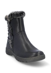 Botas de invierno negras con ribetes de pelo sintético en la parte superior, suela texturizada y detalles de cordones decorativos en el costado.