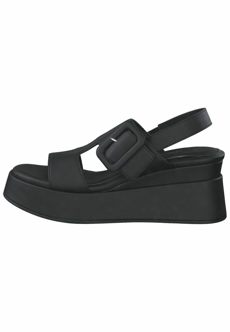Black platform sandals with a sleek, curved design, featuring a wide buckle strap, open toe, and a textured sole for grip.
