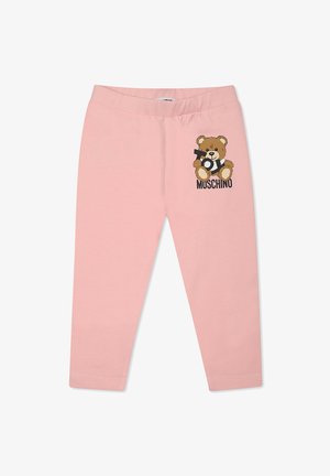 Leggings rosa realizzati in tessuto morbido con vita elasticizzata, caratterizzati da una grafica di un orso cartone e il nome del marchio "MUSCHINO" in nero.