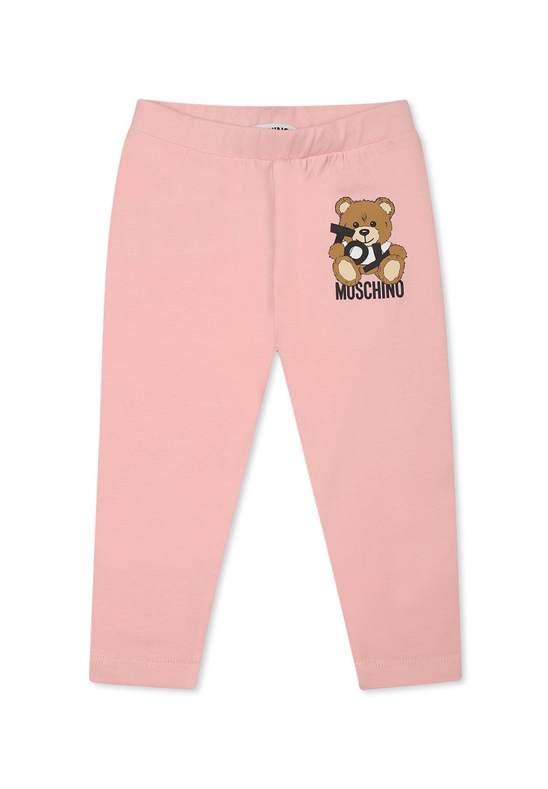 Roze leggings gemaakt van zachte stof met een elastische tailleband, met een cartoonbeerafbeelding en de merknaam "MUSCHINO" in het zwart.