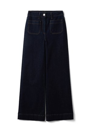 Donkerblauwe wijde jeans met opgestikte voorzakken, riemlussen en een knoopsluiting in de taille.