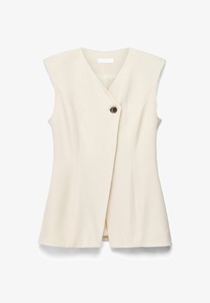 Mouwloze crèmekleurige blazer met V-hals, enkele sluiting met schildpadsbutton, gestructureerde schouders en een getailleerde pasvorm.