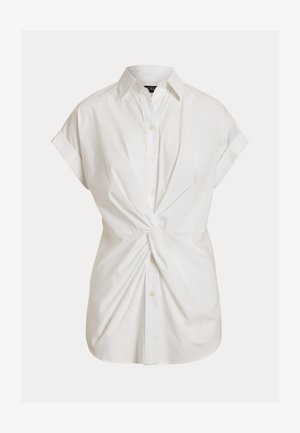 Λευκό πουκάμισο με κοντά μανίκια, κουμπιά και γιακά, με λεπτομέρεια κόμπου στη μέση.