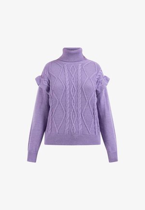 Lila kötött garbó pulóver, amely kábelmintás és puffos ujja van. Puha textúrájú, bordás alsó szegéllyel és mandzsettával.