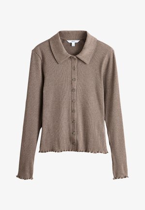 Chemise marron côtelée à manches longues avec col, ourlet et poignets festonnés, étiquetée "NEXT", présentée sur fond blanc.