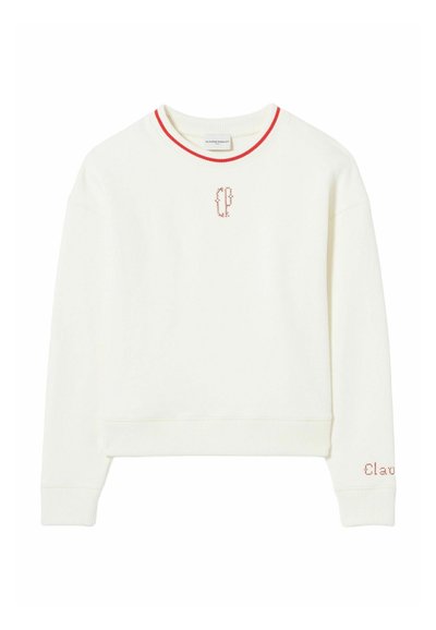 Sweatshirt blanc avec col côtelé rouge, présentant un petit logo brodé sur la poitrine et un détail de texte sur la manche. Tissu doux, coupe décontractée.
