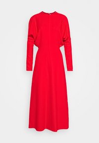 Vestido largo rojo de manga larga con cuello redondo, ajuste relajado y silueta fluida. Fabricado en una tela suave con cremallera oculta en la parte posterior.