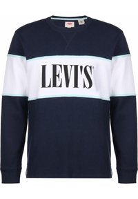 Sweat-shirt bleu marine avec des rayures horizontales blanches et bleu clair. Il présente un grand logo "LEVI'S" noir sur la poitrine. Matière en coton, coupe régulière.