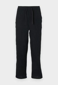 Czarne, lekkie spodnie wykonane z teksturowanej tkaniny. Posiadają elastyczny pas z troczkiem oraz zwężane nogawki.