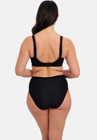 Conjunto de sujetador negro y bragas de cintura alta. Tela suave, tirantes ajustables, herrajes decorativos en la parte trasera, diseño sin costuras, cobertura total.