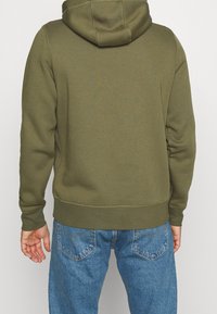 Tommy Hilfiger Jersey con capucha - dark green