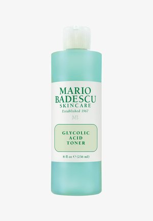 Mario Badescu Glycolic Acid Toner in een doorzichtige blauwe fles van 236 ml met een wit label en groene tekst.