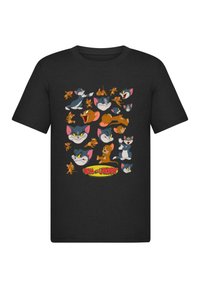 Mustar musta puuvillane T-särk, millel on mitmed värvilised multifilmitegelased Tom ja Jerry, erinevates poosides ja näoilmetes esiküljel.