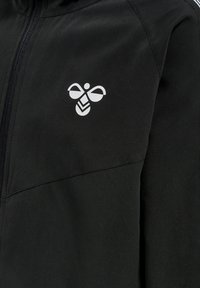 Hummel Chaqueta de entrenamiento - black denim