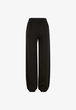 Mustad mustro jogger püksid, mis on valmistatud pehmest kangast, elastse vöökoha ja elastsete mansettidega pahkluude juures, pakkudes mugavat istuvust.