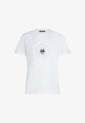 Valge lühikeste varrukatega T-särk ümarate kaelusega, mille keskel on graafik prillidega kassi kohta täpilise ringikujulise logoga.