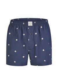 Námořnické boxerky s uvolněným střihem, zdobené malými bílými puntíky. Vyrobené ze měkké bavlny, s elastickým pasem a jedním knoflíkem na nohavičce.