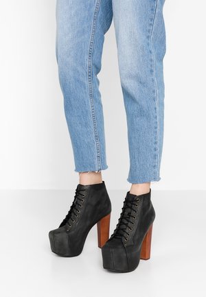 Schnürstiefelette - black