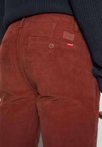 Levi's® XX CHINO SLIM TAPER PANTS - Chinos - fired brick
