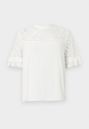 Bijela kratkodlana majica s cvjetnim čipkastim detaljima na ramenima i rukavima, s volanima na rubovima rukava i okruglim izrezom.