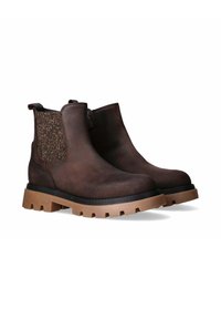 Stivali alla caviglia in pelle marrone con un accento in tessuto marrone texture e una suola in gomma robusta caratterizzata da tasselli pronunciati per una migliore aderenza.