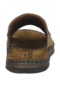 Brune ruskinds slidesandal med en buet overdel, blød tekstureret indersål, sidesyningdetalje og en gummisål med mønstret greb.