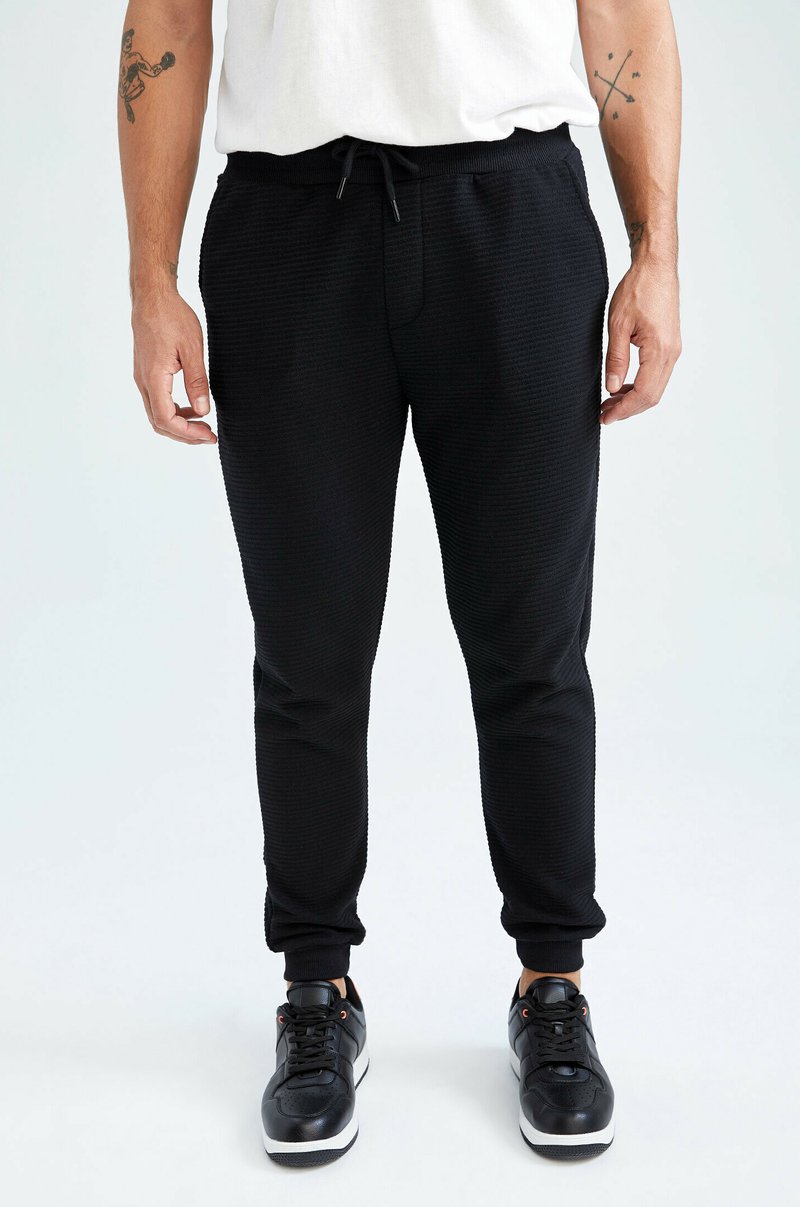 DeFacto SLIM FIT Tracksuit bottoms black Zalando.ie