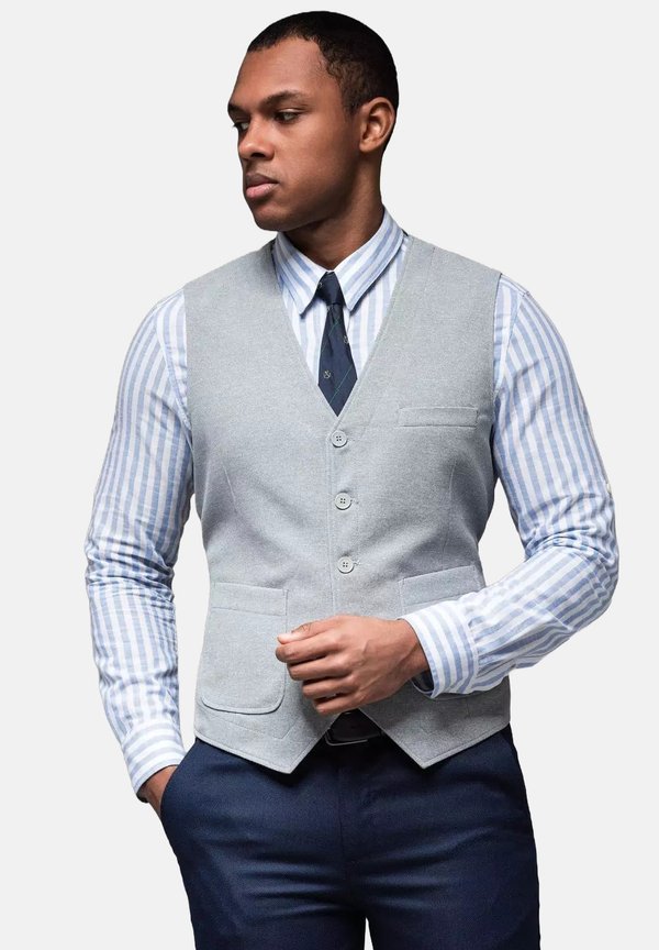 STRUCTURED WITH PATCH POCKETS - Weste