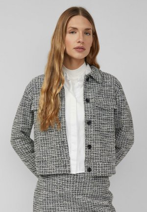 - Kurtka przejściowa