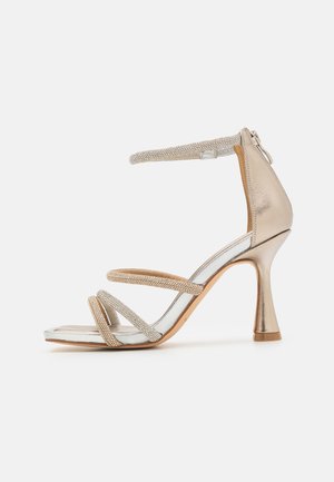 Alma en Pena Sandalen met hoge hak - metal bronze/silver