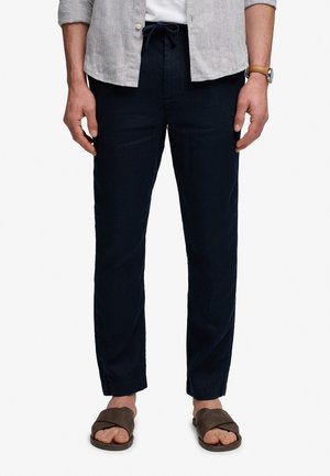 Superdry & Co M7011509A . - Chino - bleu