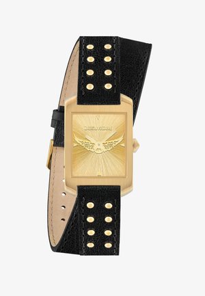 Montre rectangulaire dorée avec cadran effet soleil, emblème ailé, bracelet en cuir noir enroulable orné de clous dorés, et branding Zadig & Voltaire.