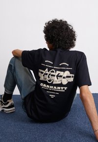 Carhartt WIP RUNAWAY - T-shirts med print - black/wax