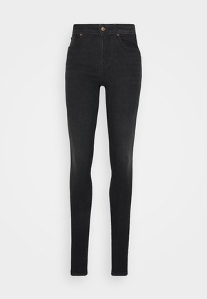 Jeans skinny pretos feitos de denim, com cintura alta, design de cinco bolsos e uma textura ligeiramente desbotada com detalhes em botão cobre.