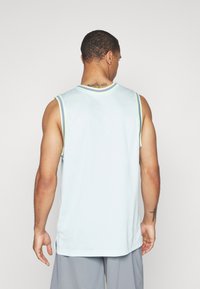 Nike Performance DNA - Top - glacier blue/bright mandarin