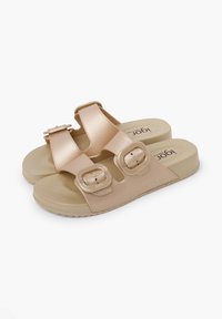Light pink sandals with two adjustable buckles, smooth synthetic upper, cushioned sole, and textured footbed for comfort.